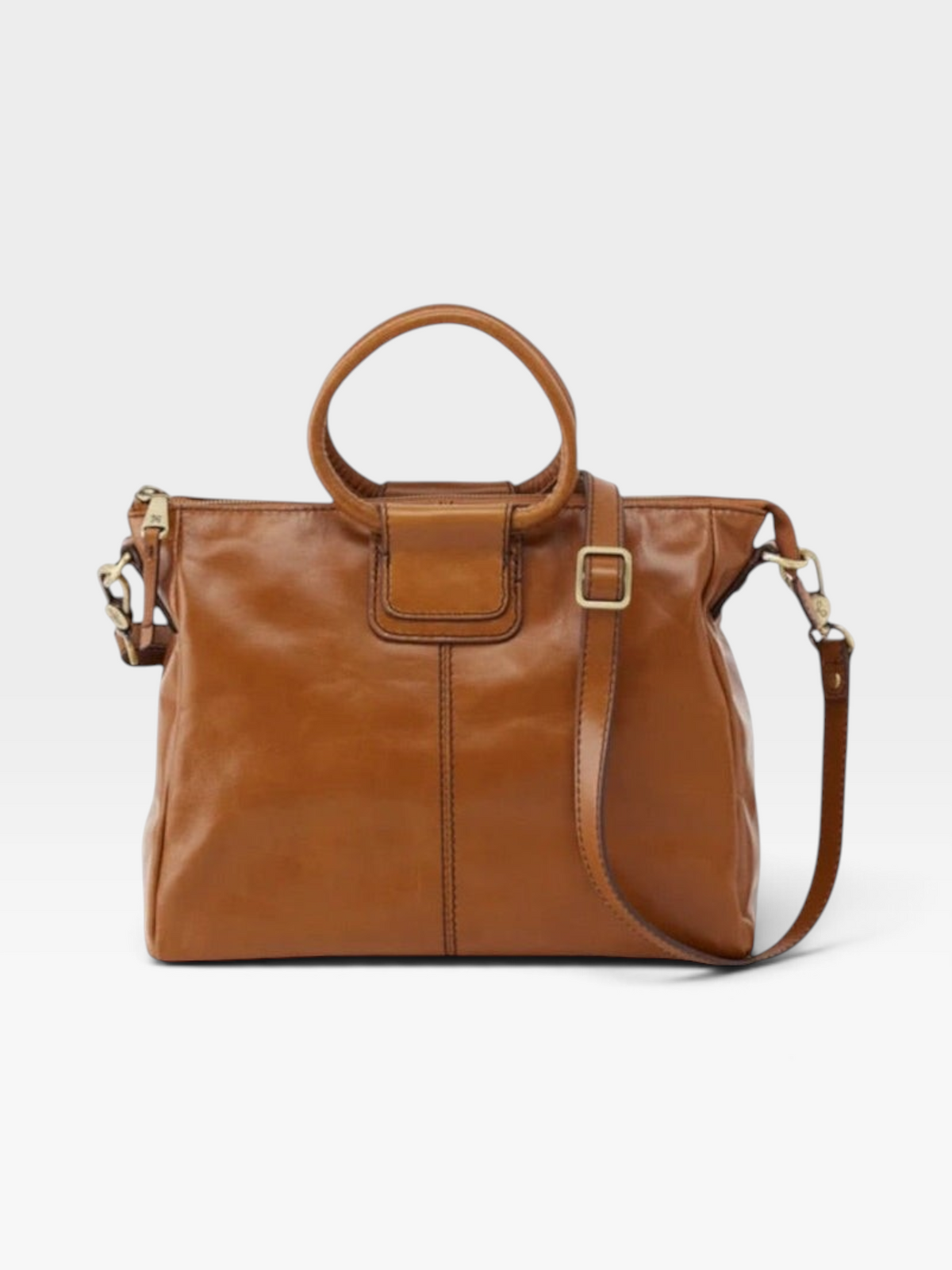 TheConsignmentBar Hobo truffle brown polished leather hobo purse with top handles and an adjustable shoulder strap.