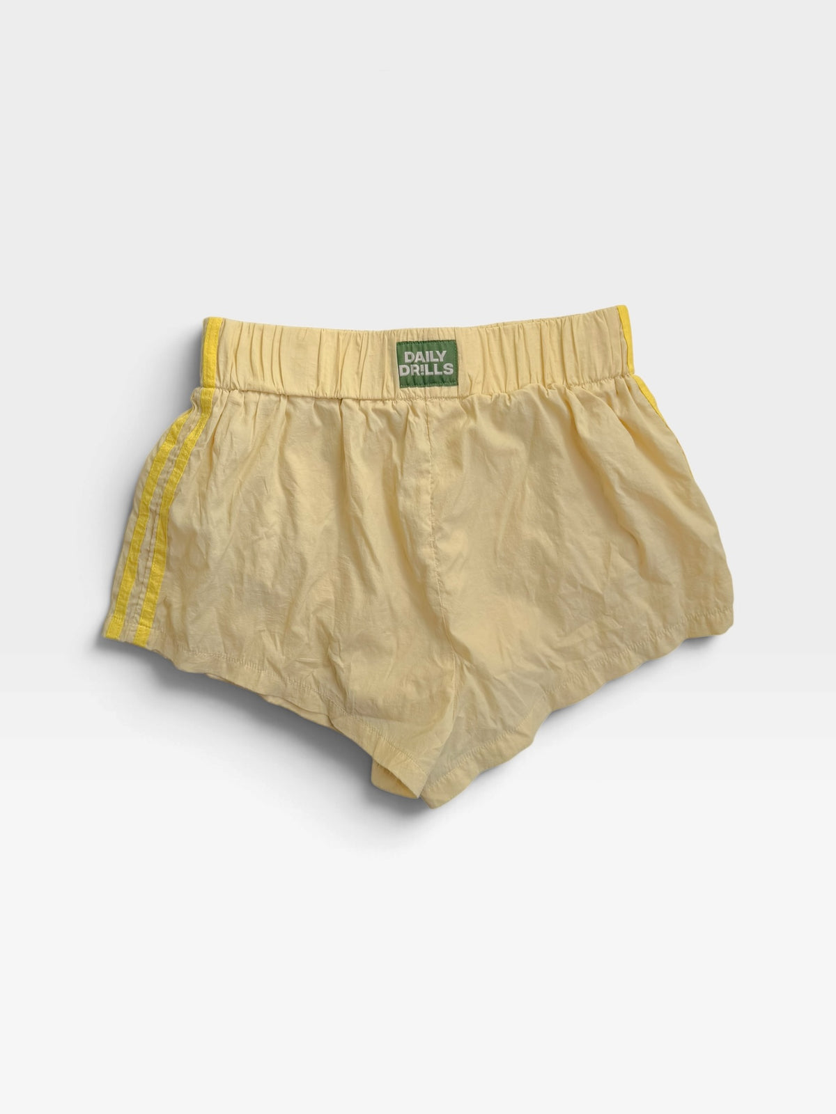 YELLOW DAILY DRILLS NYLON TRACK SHORTS | S