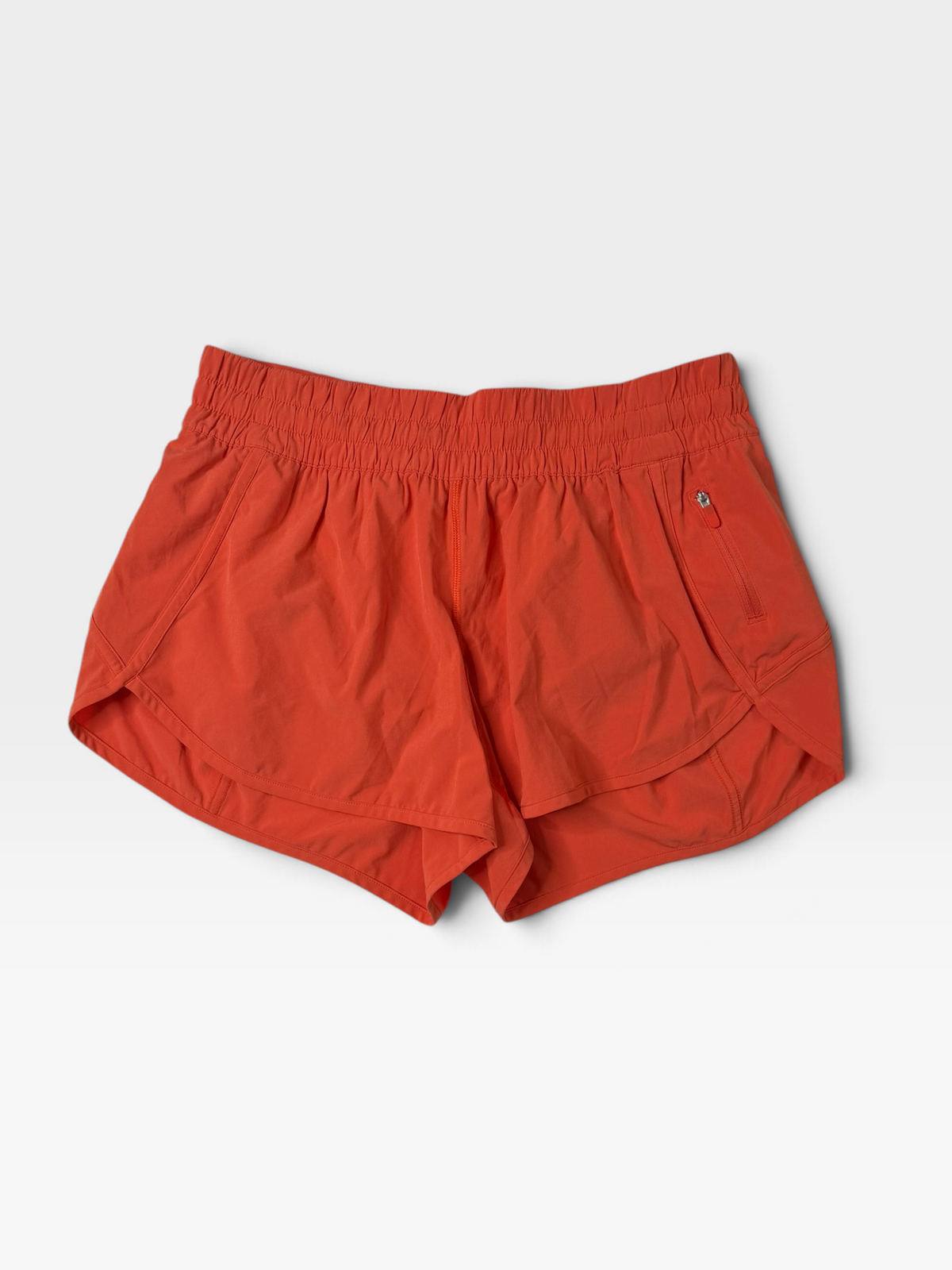 ORANGE LULULEMON SHORTS 12