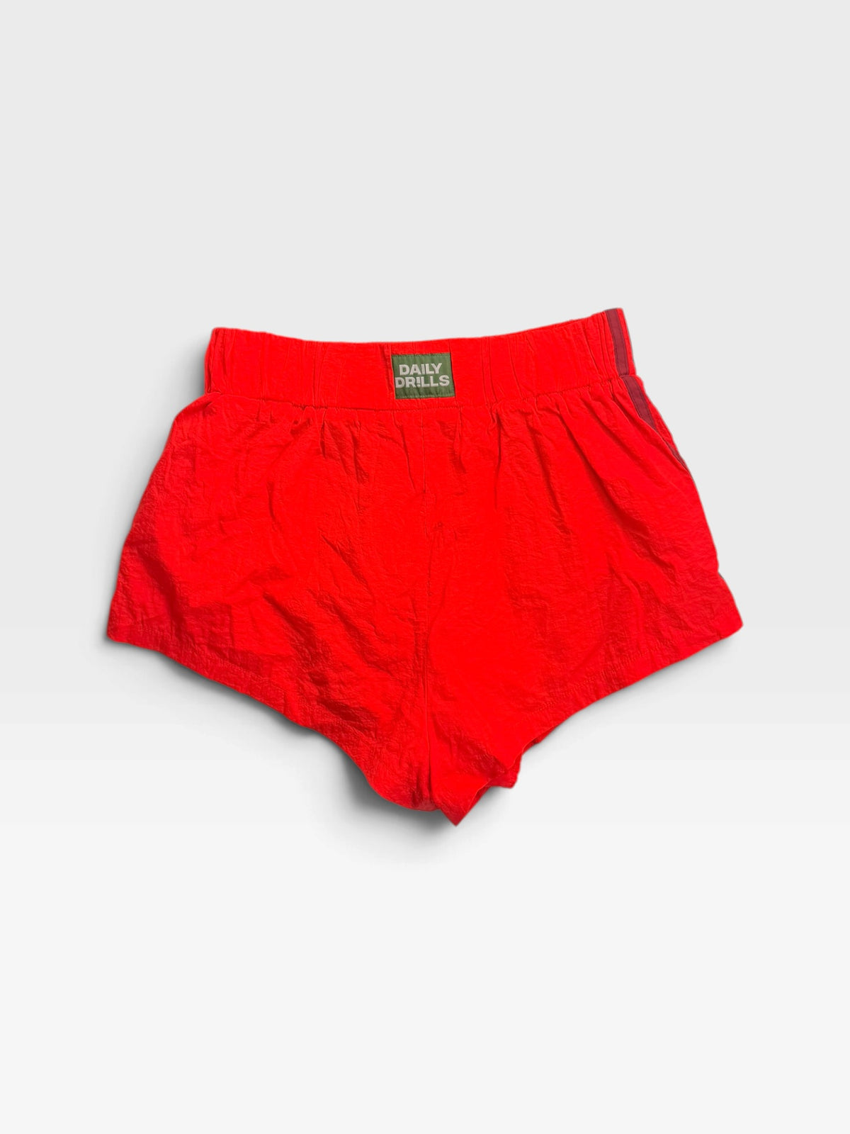 RED DAILY DRILLS NYLON TRACK SHORTS | S