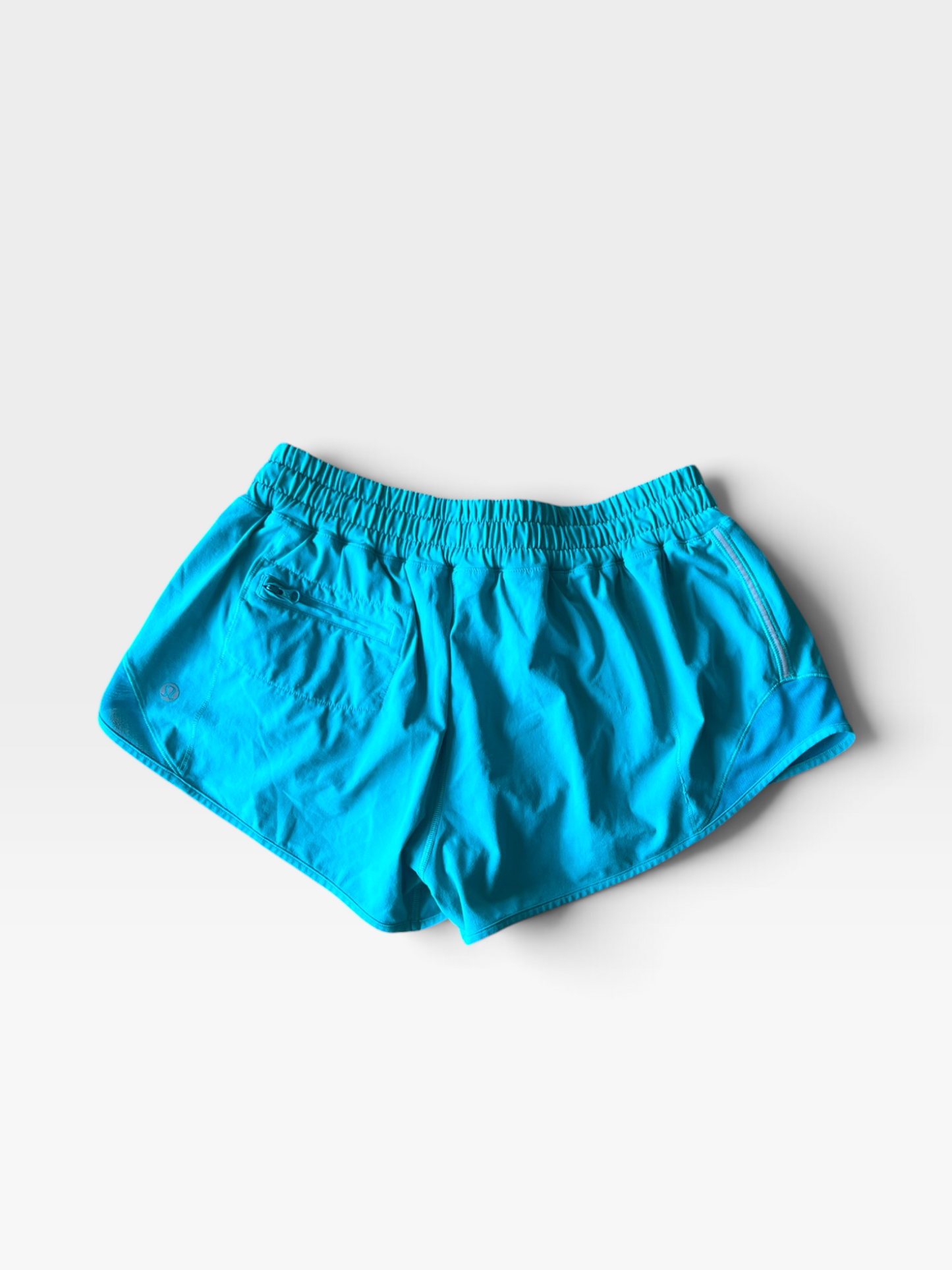 TEAL LULULEMON SHORTS 6