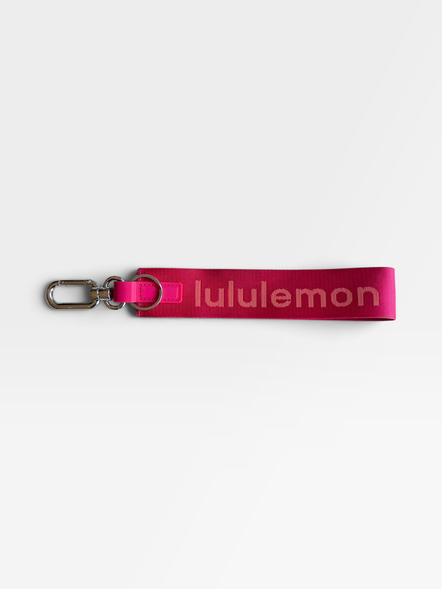 PINK LULULEMON KEYCHAIN