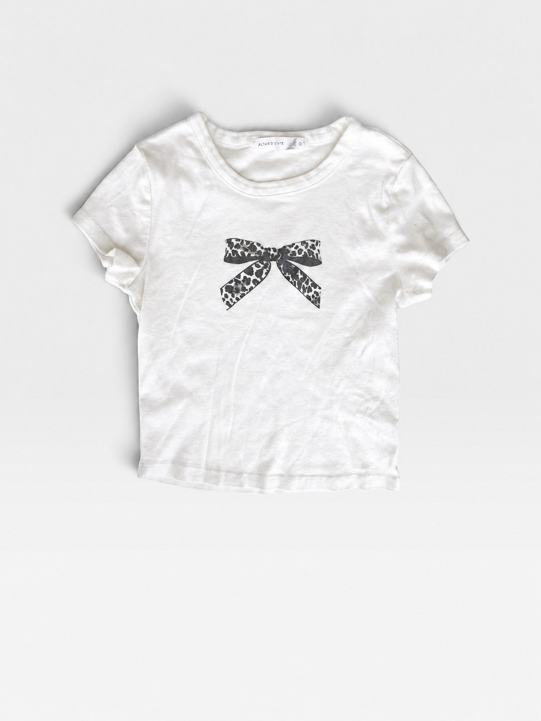 TheConsignmentBar white Altard state short sleeve t-shirt featuring a black and white leopard print bow graphic