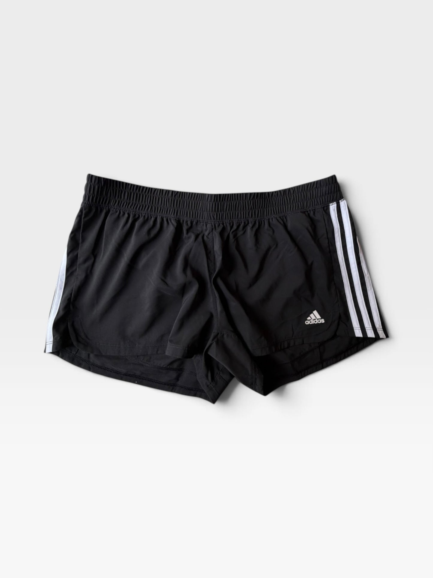TheConsignmentBar black Adidas athletic shorts with white three-stripe side detailing and elastic waistband