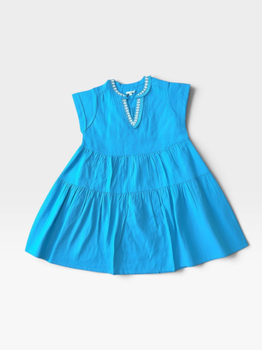 TheConsignmentBar Chico's blue short tiered dress with a split neckline and decorative beaded trim detail.