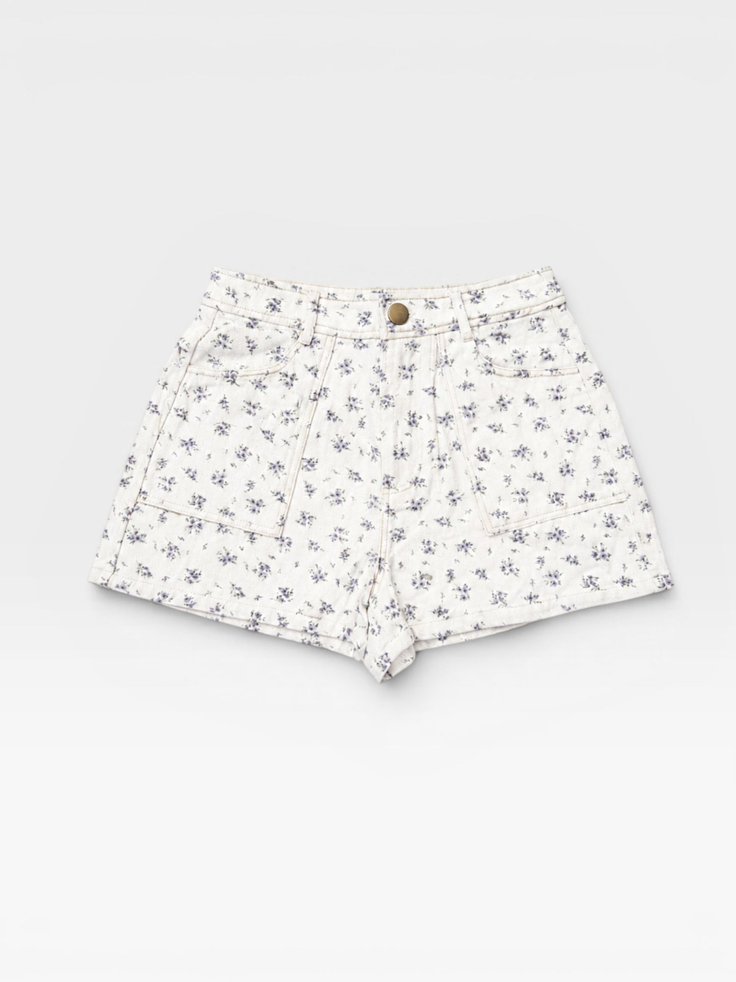 TheConsignmentBar Lulus white shorts featuring a delicate blue floral print, front pockets, and a button closure.