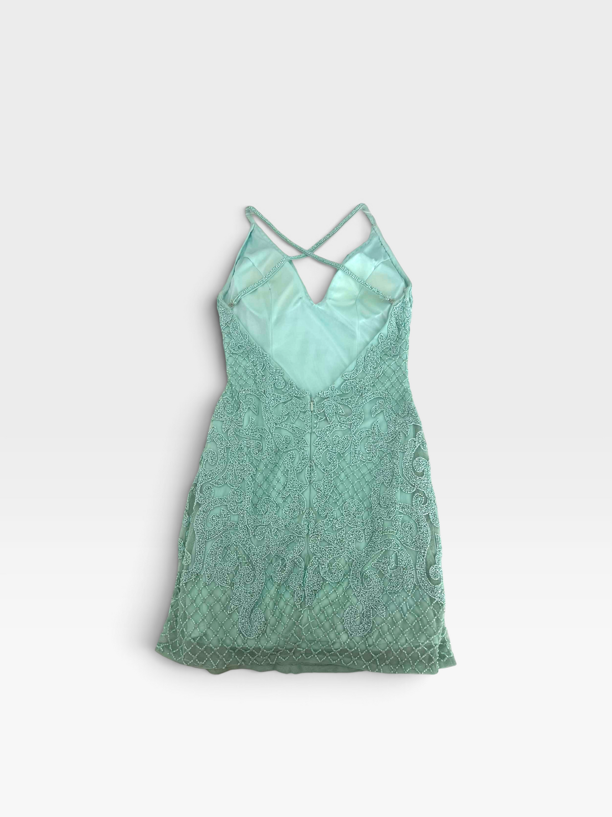 TheConsignmentBar Primavera teal mini dress with intricate beadwork, spaghetti straps, and an open back design.