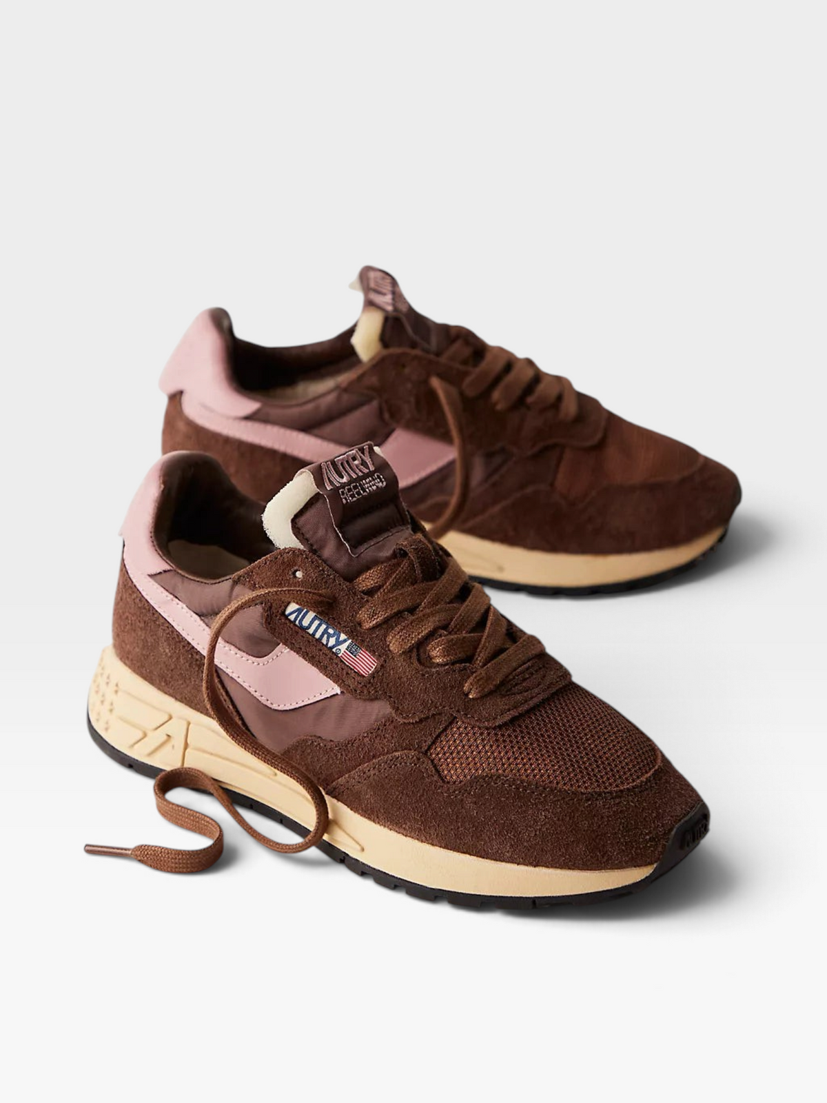 TheConsignmentBar Autry Reelwind sneakers in brown and pink suede and mesh with a vintage-style cream midsole.