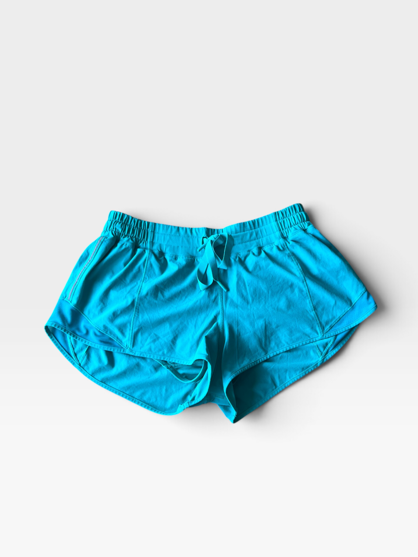 TEAL LULULEMON SHORTS 6
