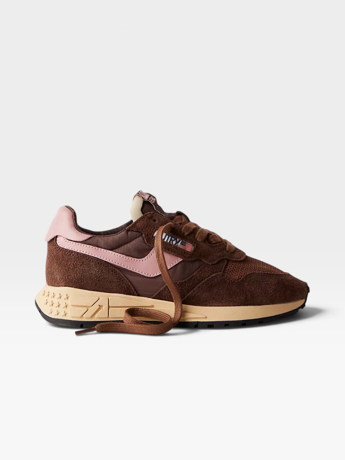 TheConsignmentBar Autry Reelwind sneakers in brown and pink suede and nylon with a cream midsole and side logo tag.