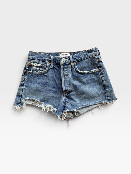 TheConsignmentBar Agolde denim shorts in distressed blue wash with raw frayed hem and button fly closure