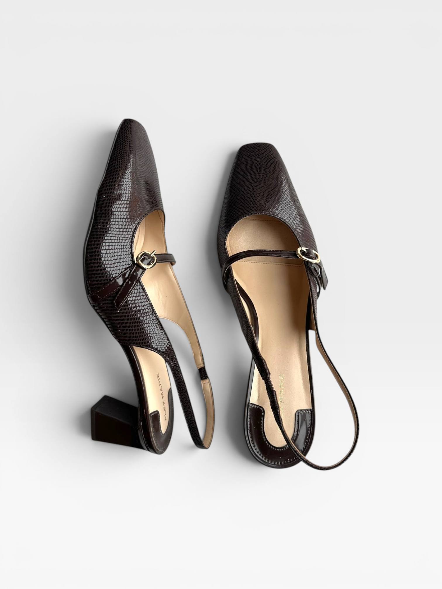 TheConsignmentBar Alex Marie brown lizard-embossed slingback heels with a block heel and gold buckle detail.