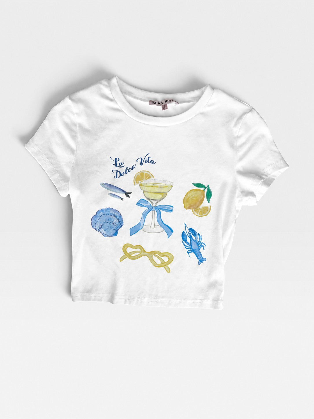 TheConsignmentBar Bailey Rose white cotton crop t-shirt with La Dolce Vita lemon and seafood graphic print