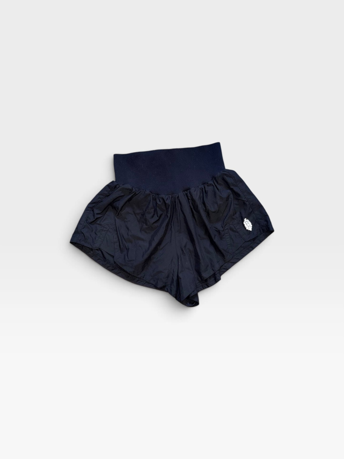 TheConsignmentBar black FP Movement athletic shorts with a wide elastic waistband and lightweight fabric