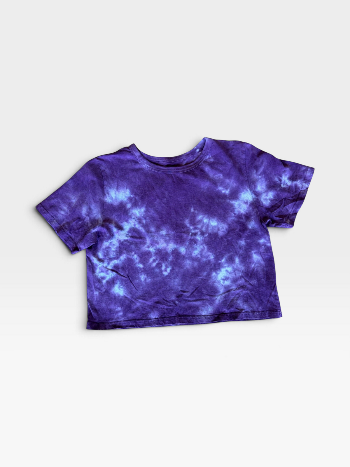 TheConsignmentBar Buddy Love purple tie dye cropped t-shirt with a round neckline and short sleeves.