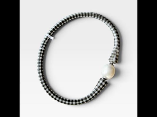TheConsignmentBar canvas black and white gingham patterned silicone bracelet with a single large pearl accent