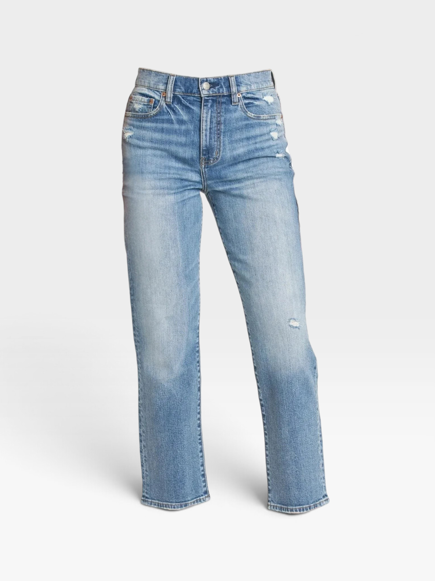 TheConsignmentBar daze light wash denim jeans with distressed details and a straight leg fit on a model
