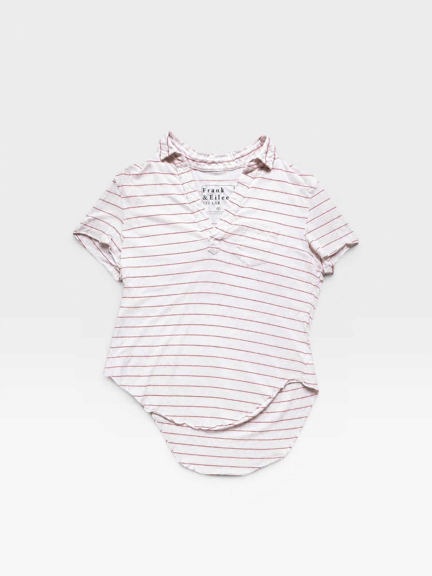 TheConsignmentBar Frank & Eileen white and red striped V-neck top with a chest pocket and curved hem.
