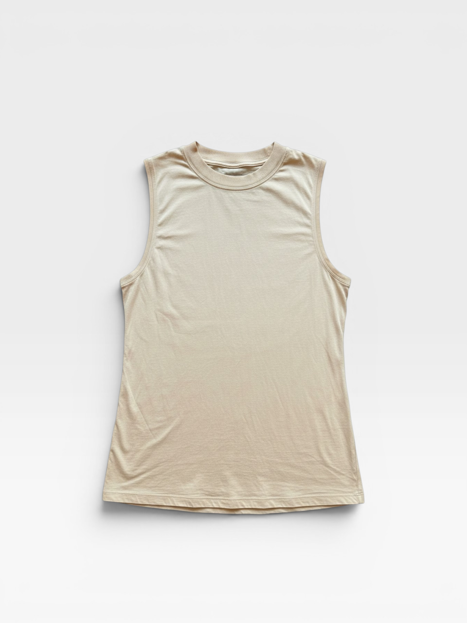 TheConsignmentBar Lululemon tan sleeveless tank top with a crew neckline and relaxed fit.