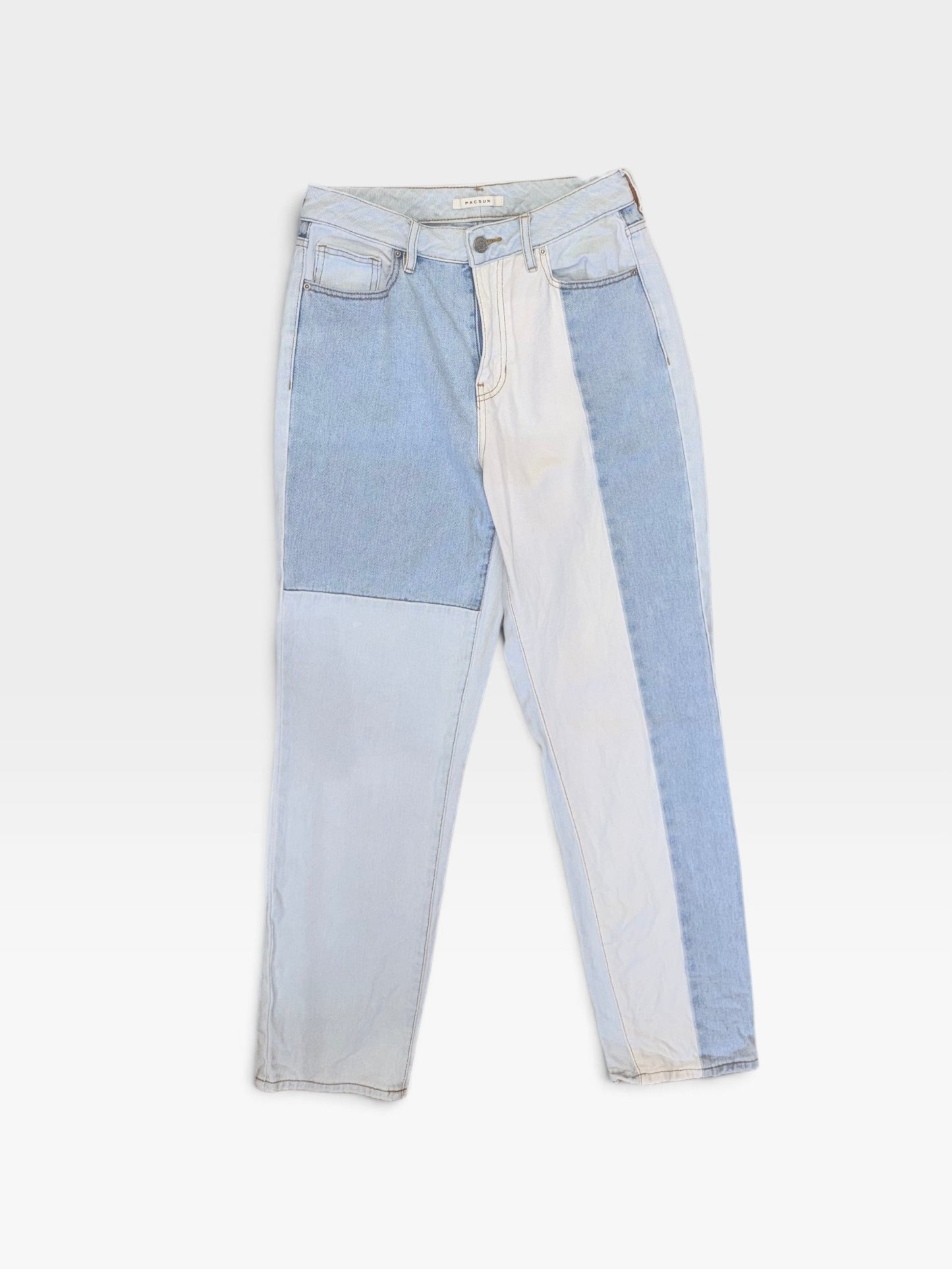 TheConsignmentBar PacSun light wash denim jeans featuring a trendy colorblock panel design in shades of blue.