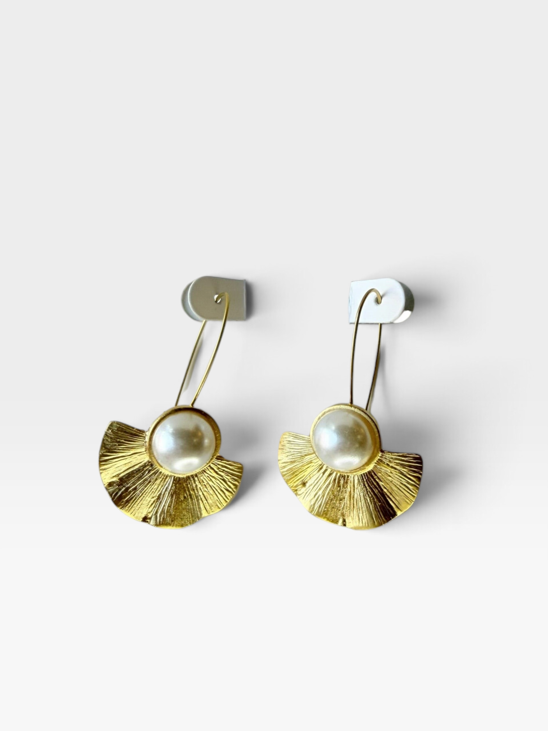 TheConsignmentBar VICTUE Virtue pearl earrings featuring a gold fan-shaped textured metal design with a central pearl.